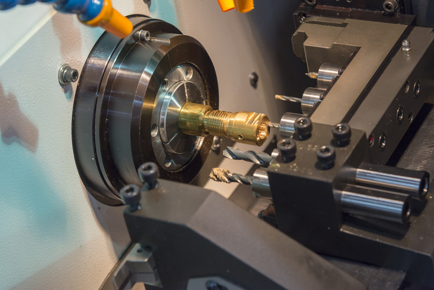 swiss turning machine shaping metal part